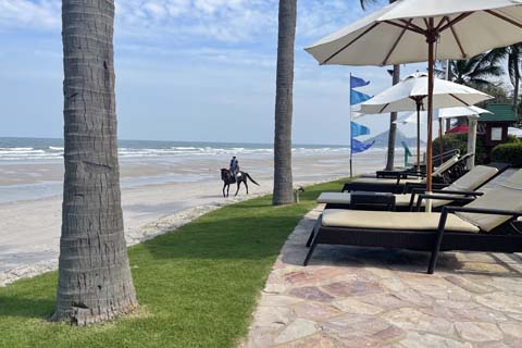 Relaxing on the serene Hua Hin beach, Thailand